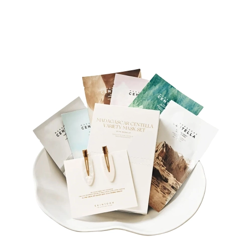 SKIN1004 - Madagascar Centella Variety Mask Set - Set mit 6 Tuchmasken und Haarklammern - 23ml + 25ml + 22ml + 23ml + 24ml + 25ml